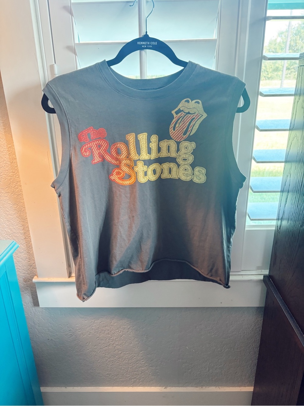 the Rolling Stones Black T-Shirt with Yellow and Red Graphic
